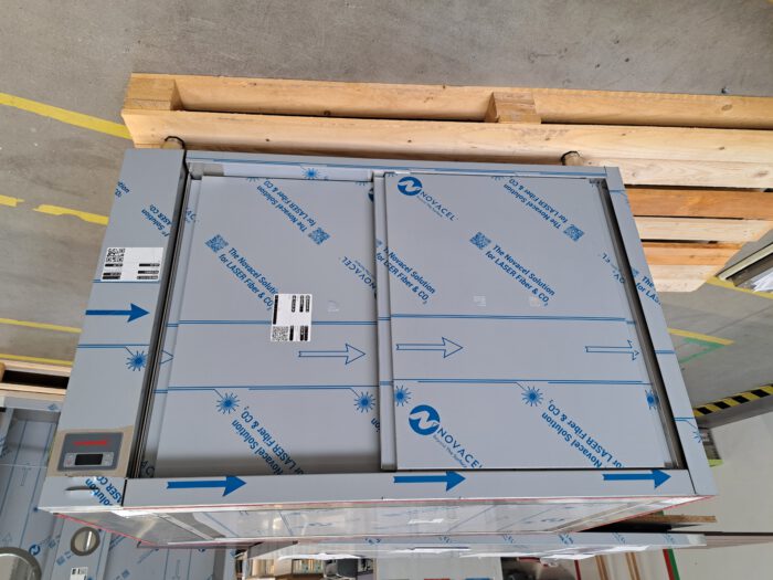 Heated cupboard with sliding doors